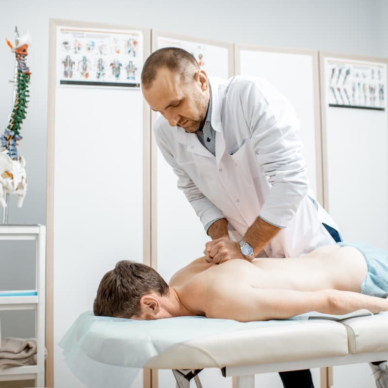 Physiotherapist treating a patient's thoracic spine